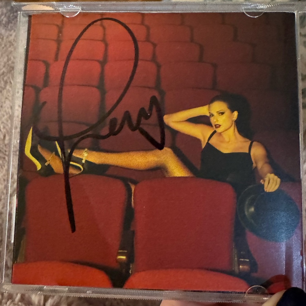 The life of a showgirl signed CD, signed by Taylor swift